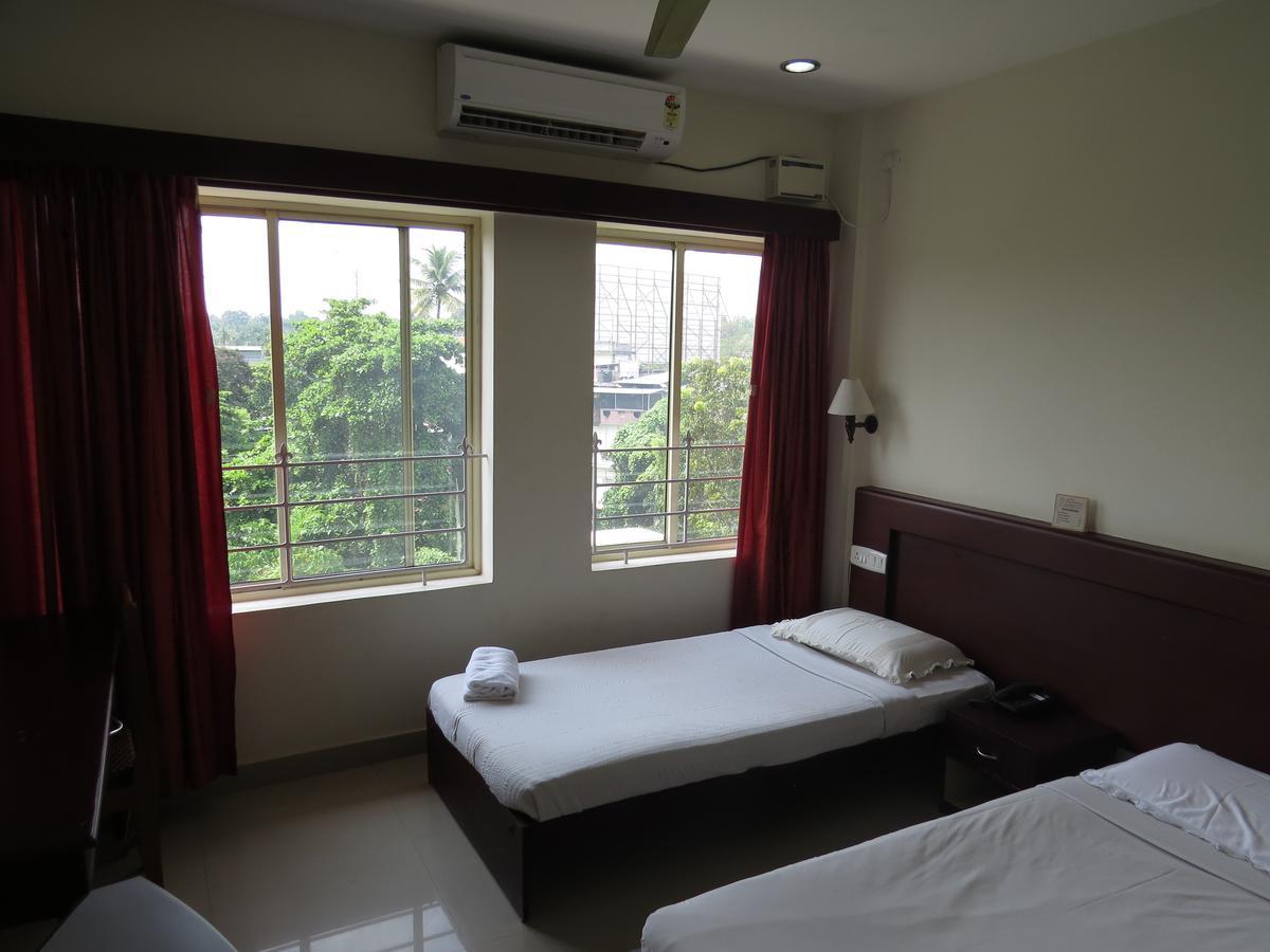 Lals Residency Hotell Adur Rom bilde