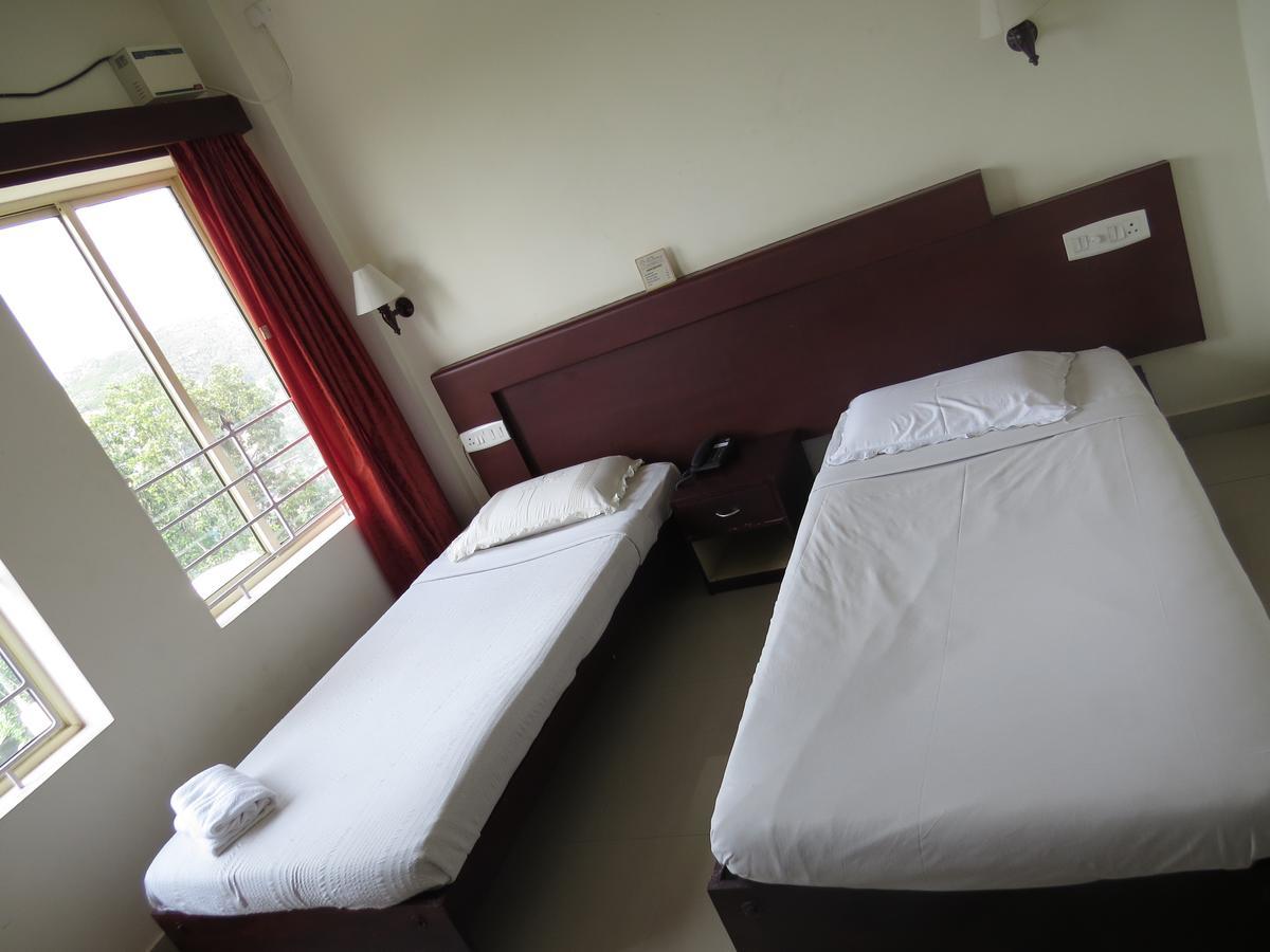 Lals Residency Hotell Adur Rom bilde